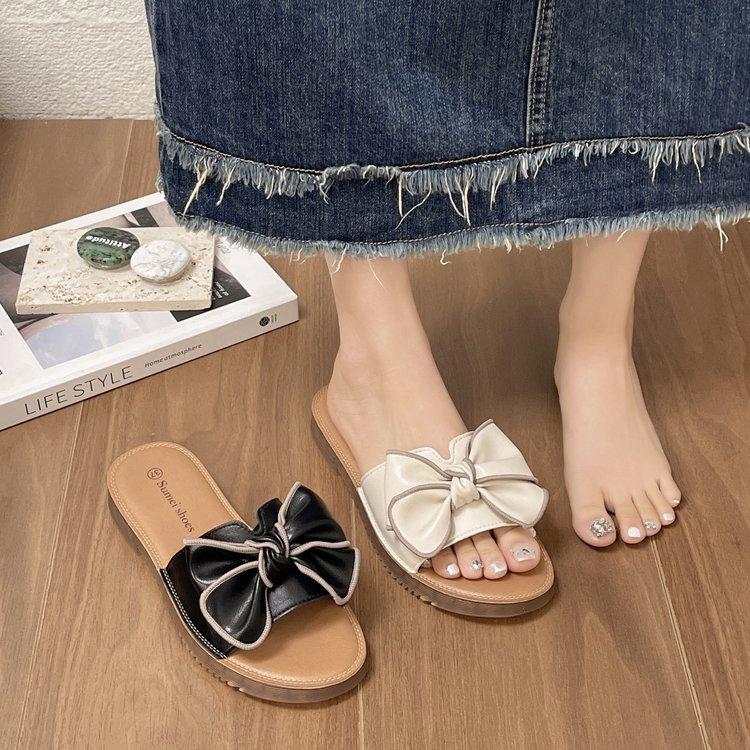 Sandals female summer soft sole flat heel fairy wind bow women's shoes beach travel vacation wear Internet celebrity soft leather sandals