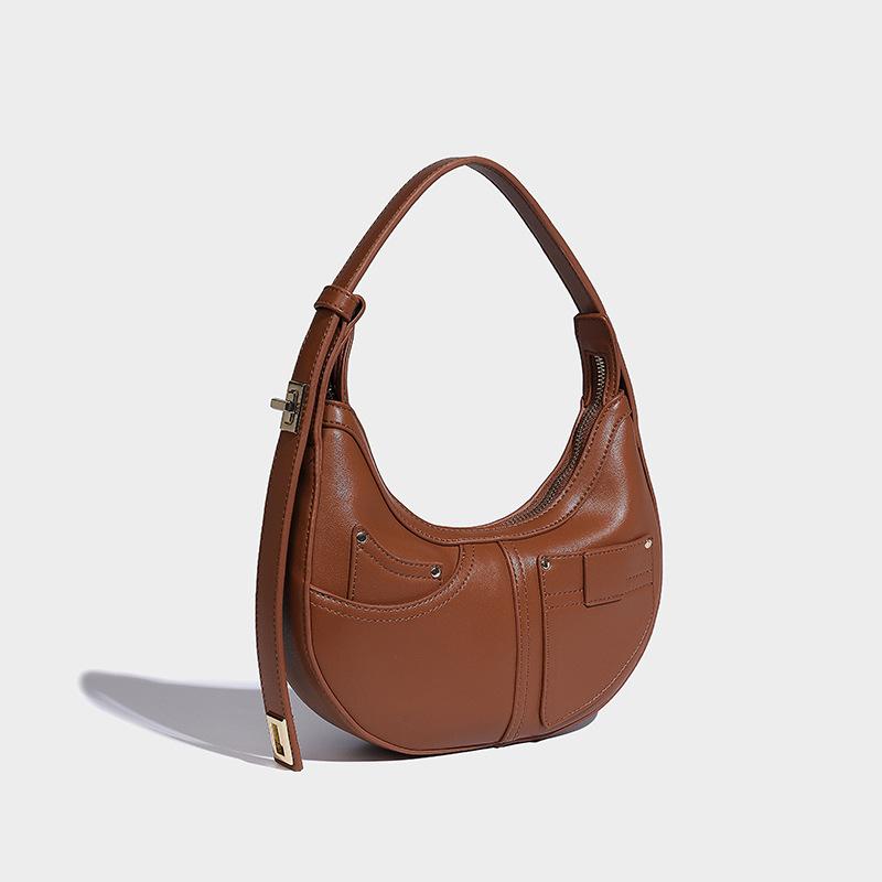 

Модна жіноча літня сумка під пахву 2024 нова висококласна нішева повсякденна портативна сумка-півмісяць на плече коричневий