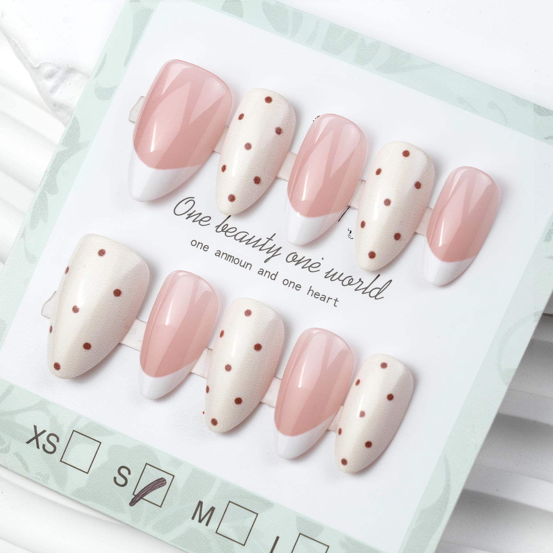 

30 pieces of European and American hot-selling cute sweet polka dot almond wearing armor advanced light luxury white French nail art