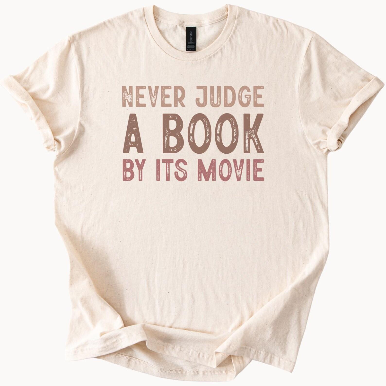 Never Judge a Book by Its Movie Graphic Tee Funny Book Lover Shirt Reading Movie Adaptation Bookworm Gift Literary T Shirt 150