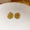 Name: "Retro Metallic Woven Flower Silver Stud Earrings"
