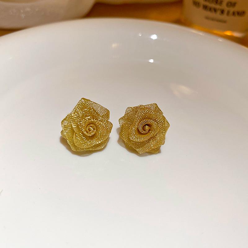Name: "Retro Metallic Woven Flower Silver Stud Earrings"