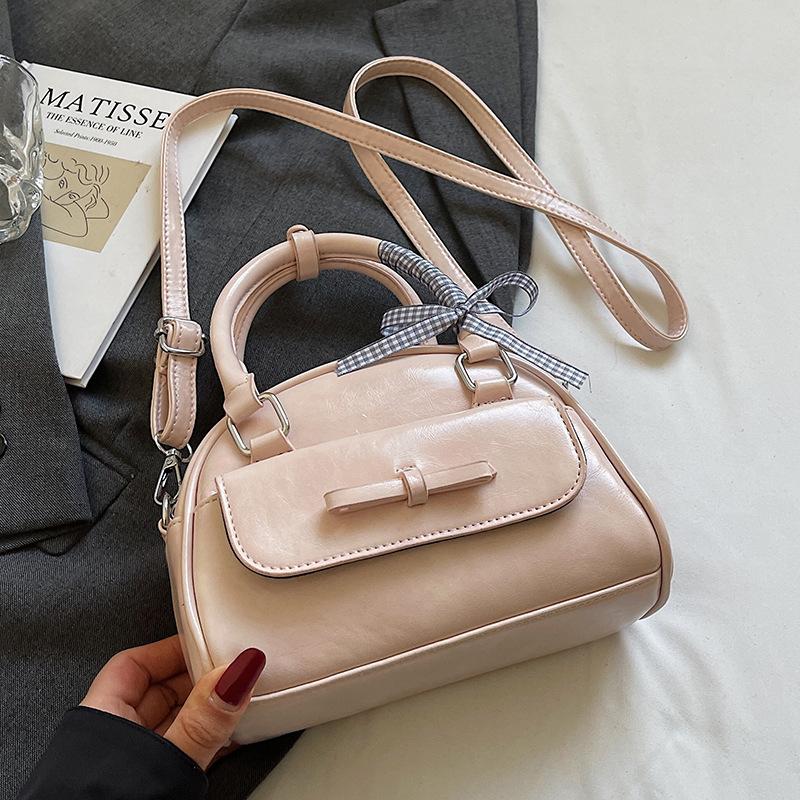 South Korea's Popular Simple Niche Portable Bowling Bag High-end Texture Ballet Style Commuter Versatile Messenger Bag Women