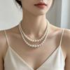 Elegant Retro Double-Layer Clavicle Necklace: Chic and Versatile Fashion Accessory for Commute and Formal Wear.
