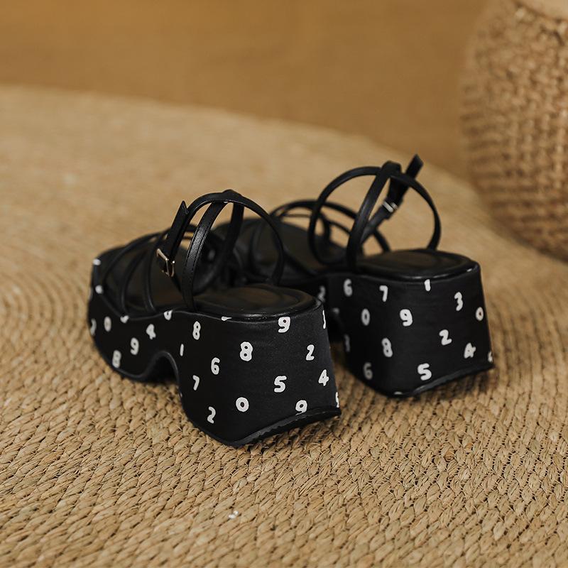 

Summer sandals women s slope heel thick sole heightened 7cm waterproof table thick heel one-word buckle black sweet and cool Roman shoes 39