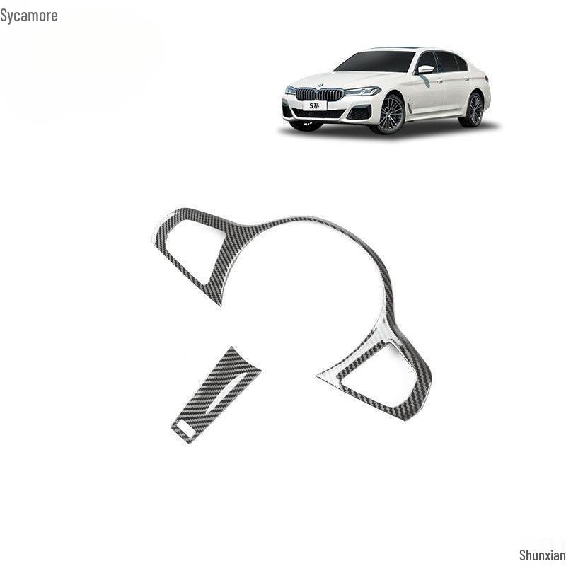 Carbon Fiber Interior Trim Set for BMW 5 Series: Center Console, Gear Shift, Multimedia Lift Panel, and Air Vents.