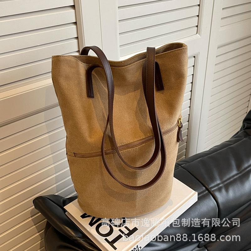 

Жіноча модна сумка 2024 року великої місткості в стилі ретро, ​​портативна сумка-відро для приміських поїздок високого класу з текстурою. хакі