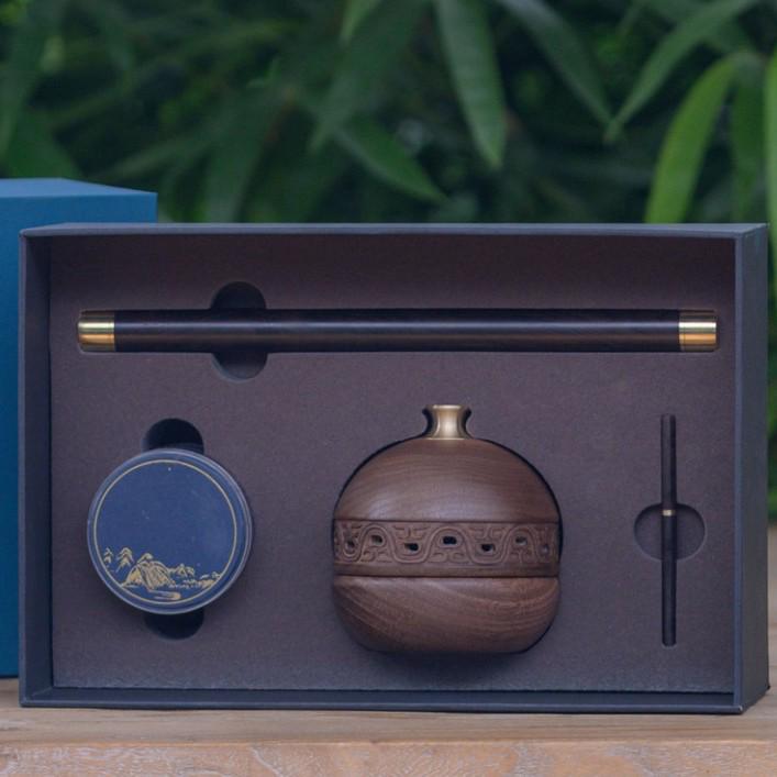 

Bronze Dynasty Incense Set: Creative Chinese-Style Holder and Rest with Agarwood & Sandalwood Sticks in Gift Box.