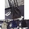 Elegant Women's Canvas Black Handbag With Adjustable Shoulder Strap And Soft Handle