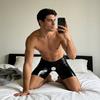 Men's Faux Leather Short Pants Sexy Open Crotch Shiny Boxer Shorts Glossy Stretchy Hot Pants for Parties And Date Nights