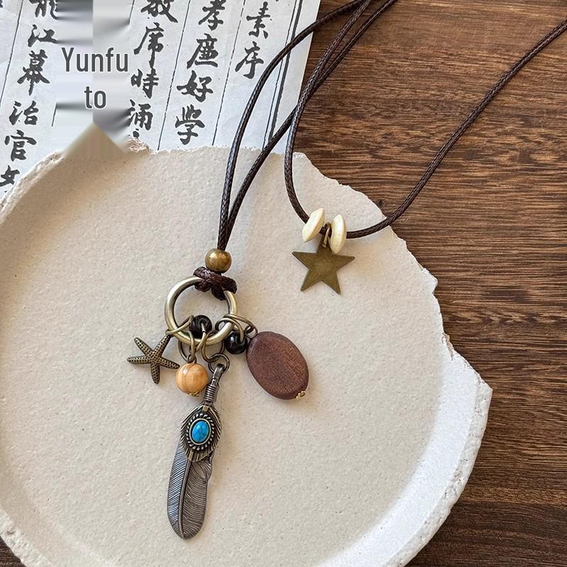 Retro Chinese Tassel Necklace: Unique Ethnic Style Women's High-End Clavicle Chain.