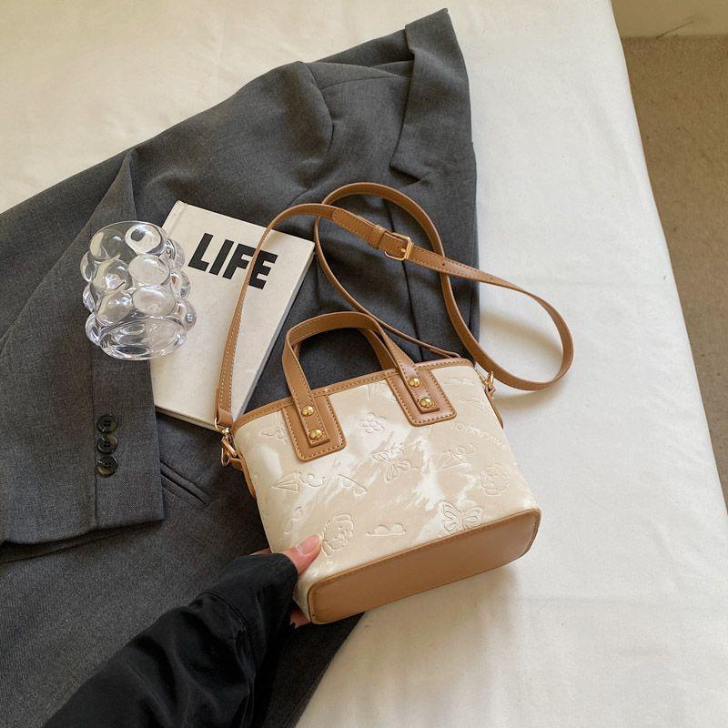 

Today s popular small bags for women s spring and summer new versatile messenger bags, portable bucket bags