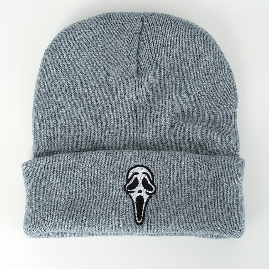 Unisex Trendy Knit Hat with Embroidered Skull Design for Street, Climbing, and Travel.