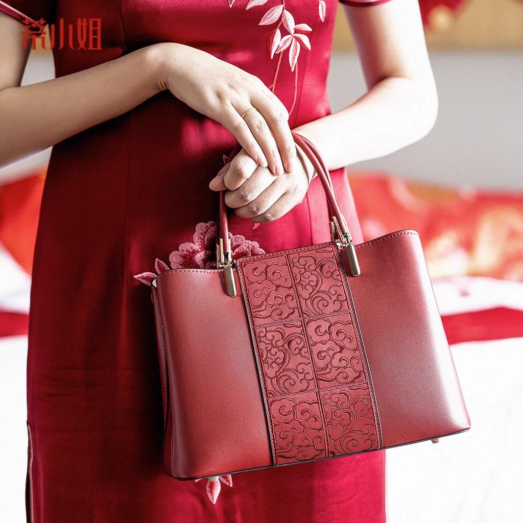 Mom's Wedding Bag, A Red Bride's Bag, Exudes A Sense of Luxury. Middle-aged Happy Grandma's Wedding Handbag