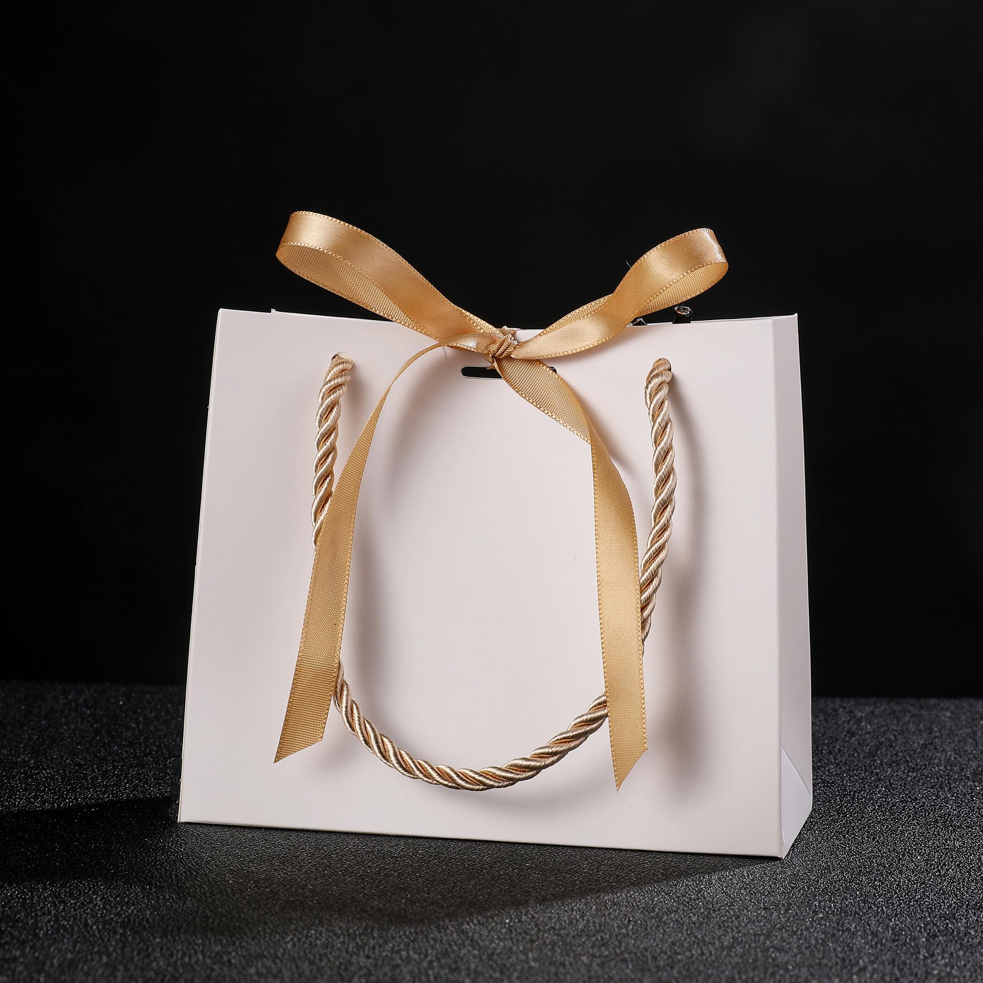 

20pcs Pretty Pink Kraft Gift Bag Gold Present Box for Gift Books Packaging Gold Handle Paper Box Bags Kraft Paper Gift Bag 20pcs& 14x6x12cm