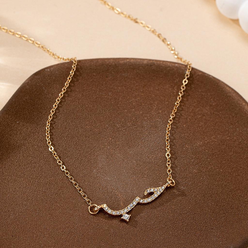 Delicate Chain Necklace with Arabic Script Pendant Featuring Small Embedded Crystals Elegant Minimalist Design for Everyday Wear