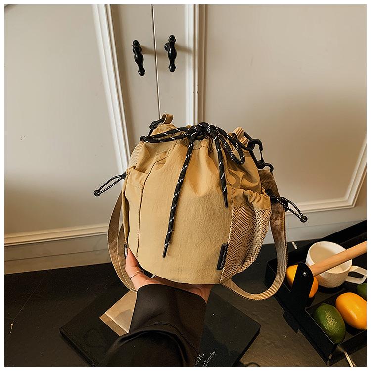 Canvas-Tasche Damen 2025 neue trendige Marke Handy-Tasche Freizeit Sport Reise Umhängetasche kleine Eimertasche