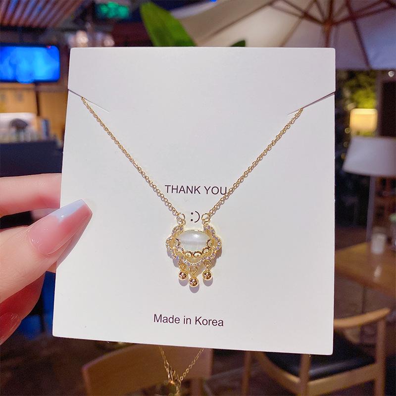 Minimalist Clavicle Necklace: Japanese & Korean Style, Luxurious Real Gold-Plated Titanium Steel Pendant for Women