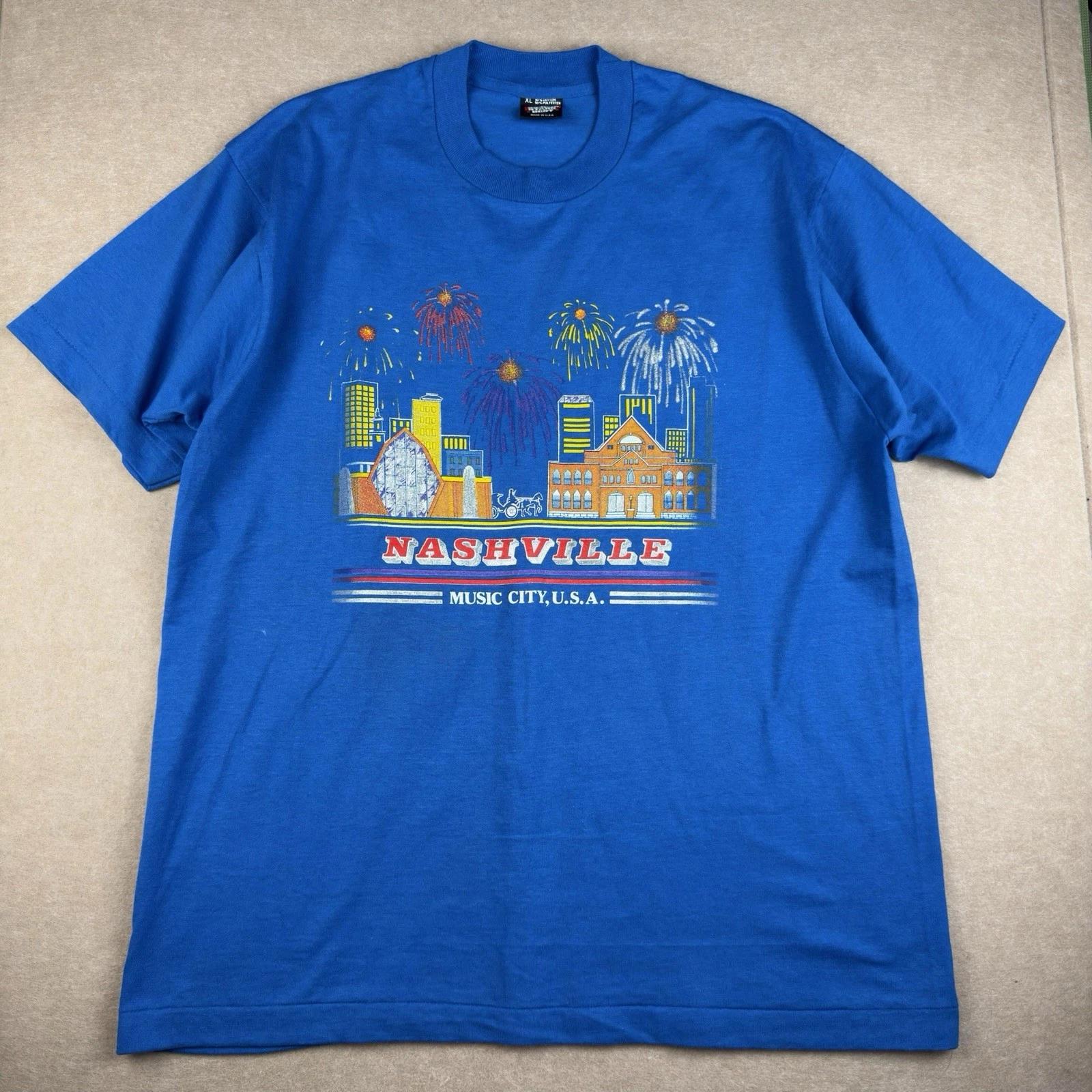 

Vintage Screen Stars Best Shirt XL Nashville USA Blue Fireworks 80s 90s SS M
