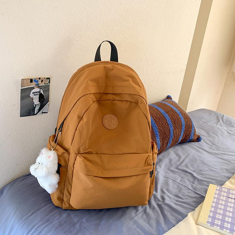 

School bag female college student Korean version of leisure backpack simple and versatile large capacity high school student computer backpack trend single bag оранжевый