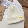 Smiley face label wool hat female autumn and winter warm bag head couple trendy brand cold hat solid color student male knitted hat