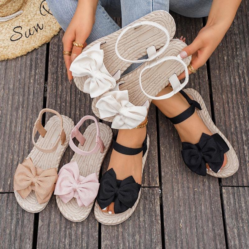 Summer new women's casual and comfortable one-word bow flat-bottomed beach sandals one size fits all