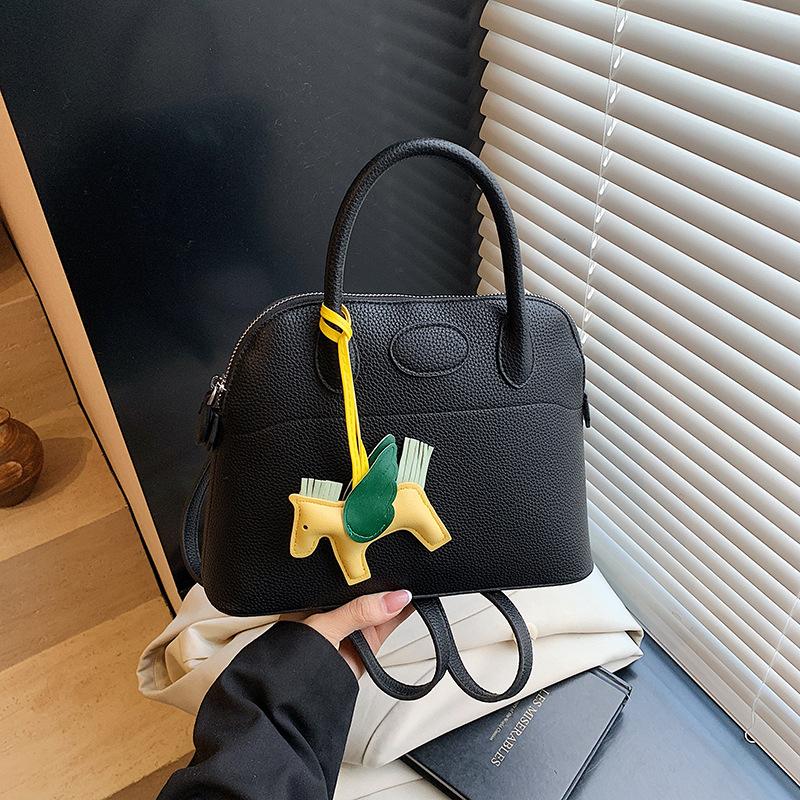 Fashion backpack women's new high-end versatile handbag niche design shell bag