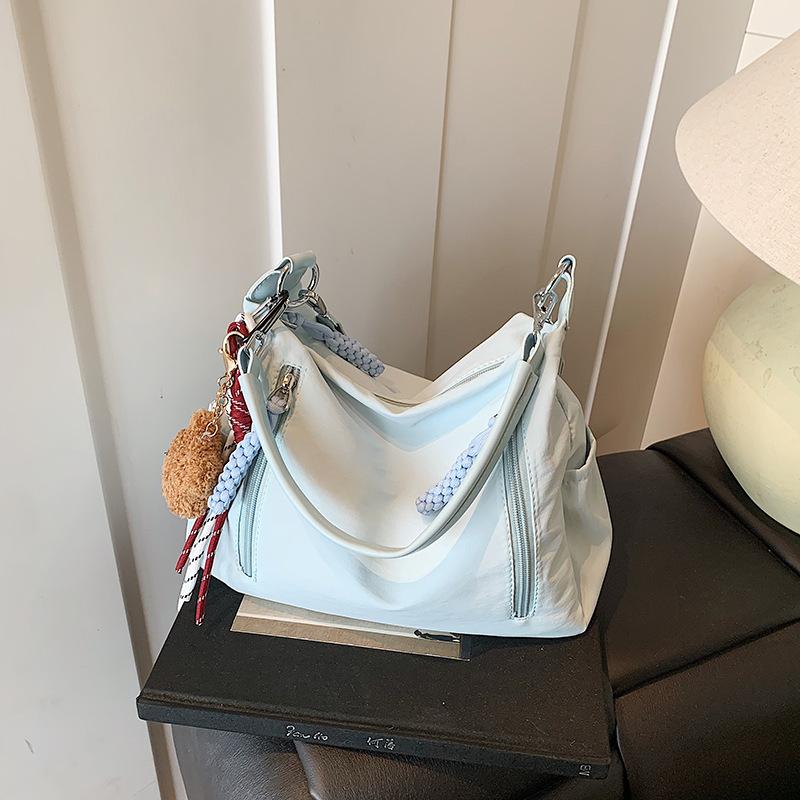 

Summer new casual simple tote bag women commute to work large capacity shoulder bag crossbody armpit bag синий