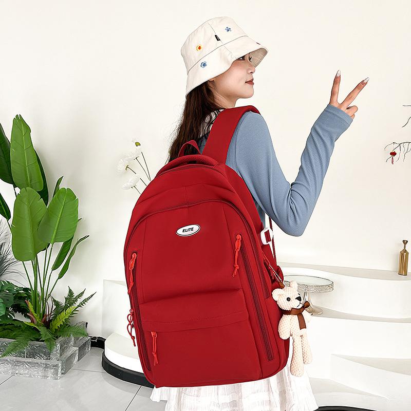Schoolbag new schoolbag simple, lightweight and versatile large-capacity backpack junior high school student college student niche fashion backpack