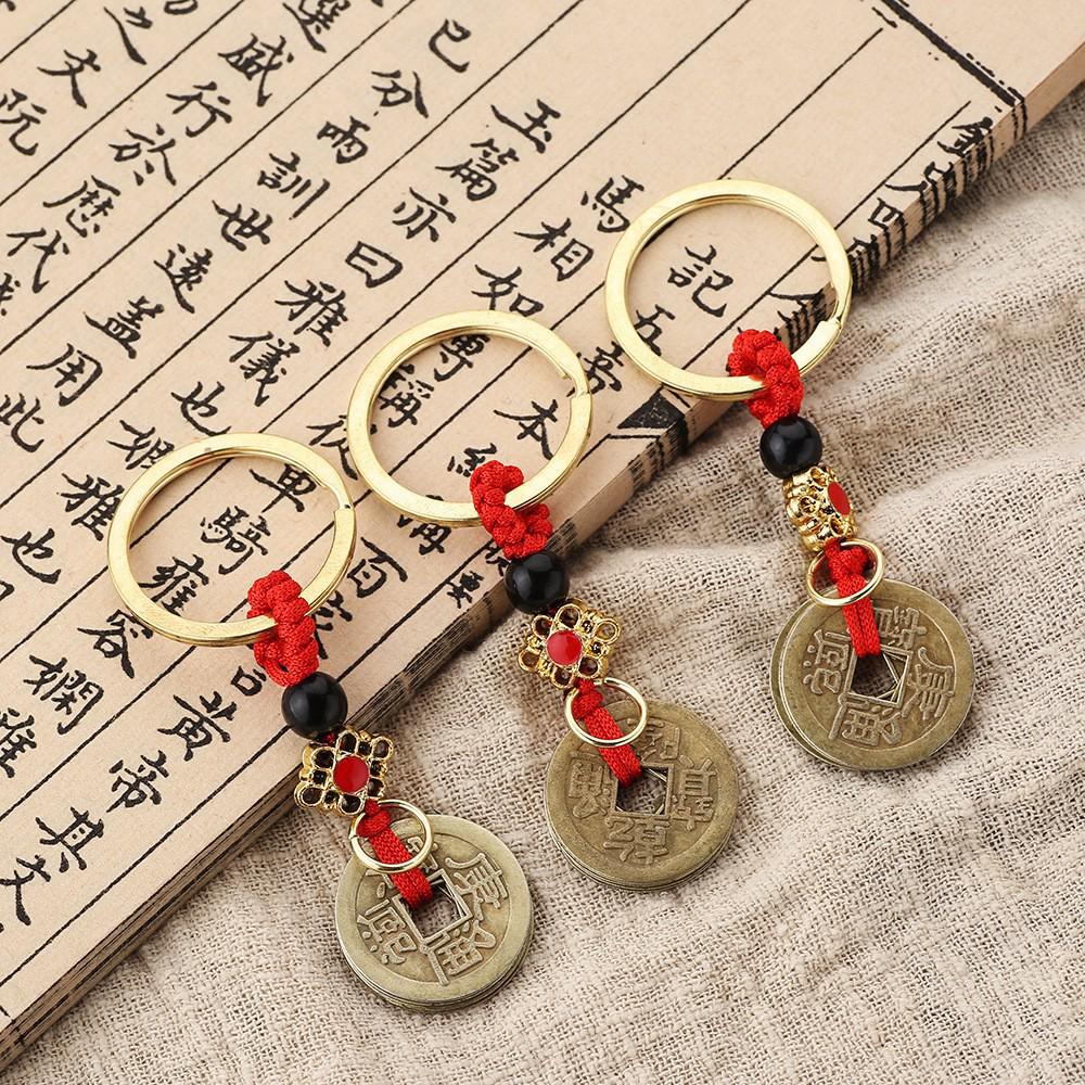 

Брелок для денег Five Emperors из латуни с подвеской из желтой и красной веревки