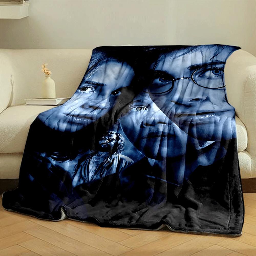 Dark, blue-toned portrait with sharp contrast and partial face visibility. for all seasons blanket lunch break throw gift