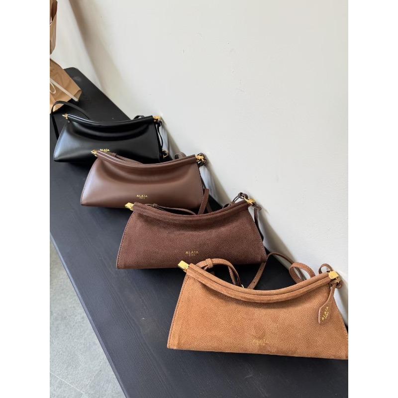 Französisches Nischendesign minimalistischer Stil Rindsleder Schulter Achseltasche Pendeln einfach Mode vielseitig Damenmode Baguette-Tasche