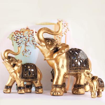 1 ks Zlatá pryskyřičná soška slona Feng Shui Elegantní socha slona s chobotem nahoru Figurka pro štěstí a bohatství Řemeslné ozdoby Domácí dekorace