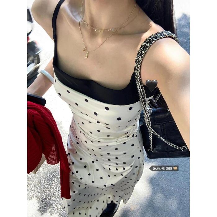 Pure desire style temperament polka dot suspender dress women's summer new design sense splicing waist showing thin long skirt tide