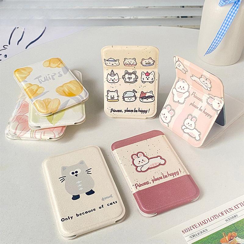 Stolní kosmetické zrcátko Jednobarevné PU kůže Jednoduché Přenosné Ruční kosmetické zrcátko Skládací Studentské Kompaktní Roztomilé Kapesní zrcátko