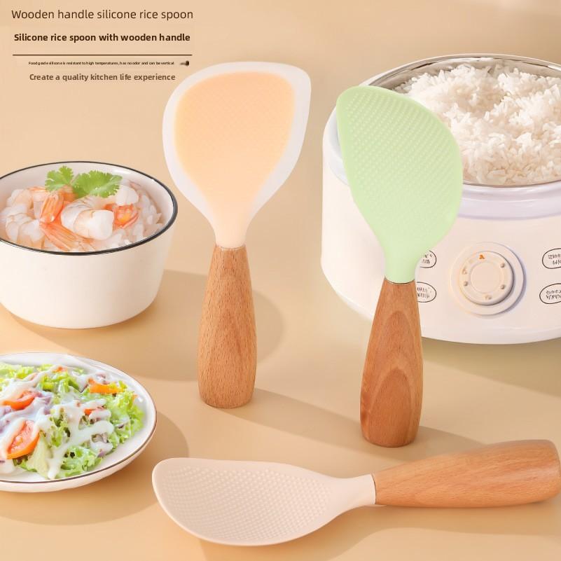 Silicone rice spoon, non-stick to rice, can be used as a standing household rice spoon.Wooden handle rice spoon and rice spatula
