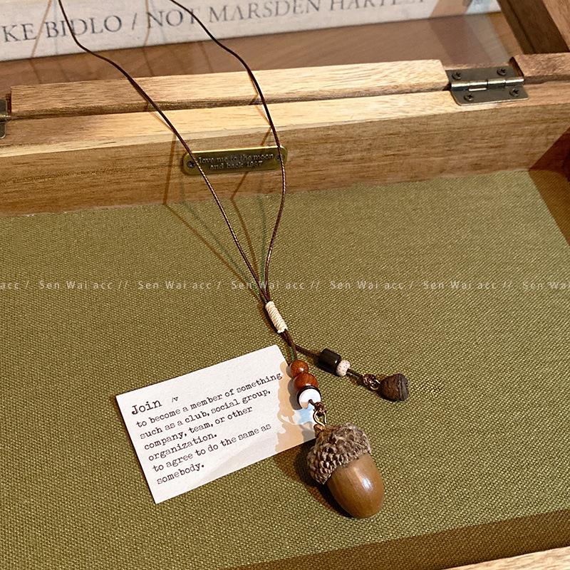 New Chinese style long acorn pendant necklace female retro ethnic style zen wooden sweater chain hanging neck