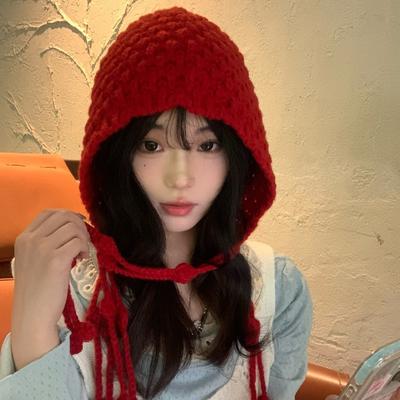 Herbst und Winter Warme Wollmütze Handgestrickt Hohlkopfmütze für Damen Ethnischer Stil Quaste Ohrschutz Kopfstrickmütze