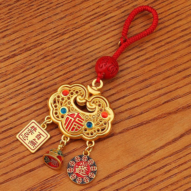 Zakiram Gold Sand Pendant: Attract Wealth, Ensure Peace & Happiness, Includes Fu Card, Perfect As Bag Accessory or Car Keychain.