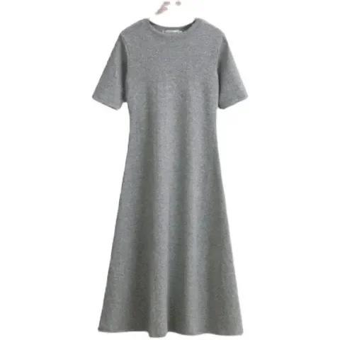 Black short-sleeved dress women's medium and long summer new student loose long over-the-knee thin a-word skirt