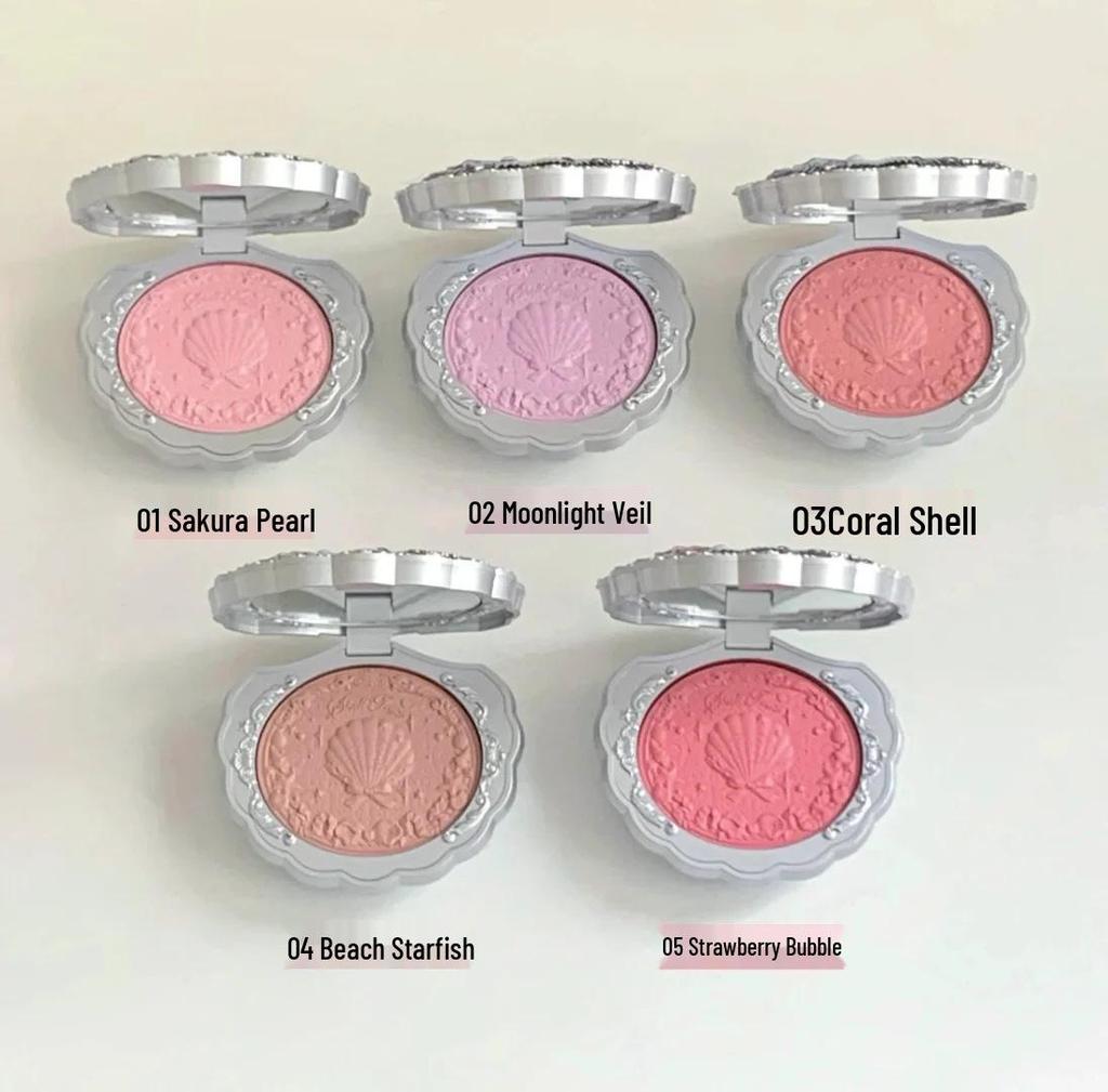 Flower Knows Pearl Satin Blush, Lip Glaze, Eyeshadow, Highlighter, Under-eye Pen, Perfume, Color Correcting Emulsion.