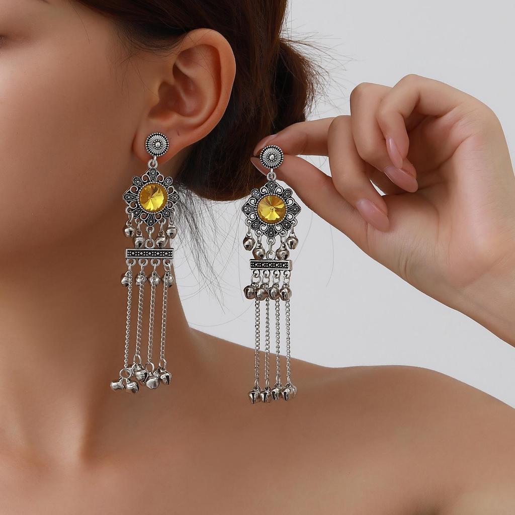 Elegant Retro Tassel Dangle Earrings: Exotic, Artistic, Classic, and Exquisitely Hollowed for a Dignified Look.