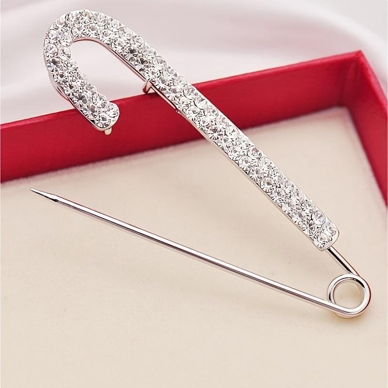 2pcs Fashionable delicate clothes button pin corsage, made of synthetic Zirconia and alloy. It is the waist circumference of the pants that is revised