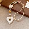 Retro Ethnic Heart Necklace: Wooden Flower Pendant Sweater Chain for Women