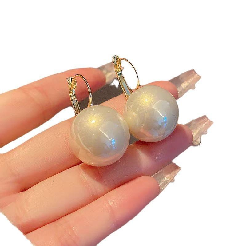Hong Kong style elegant temperament pearl earrings women's ear buckle type niche unique design earrings European and American cold wind earrings
