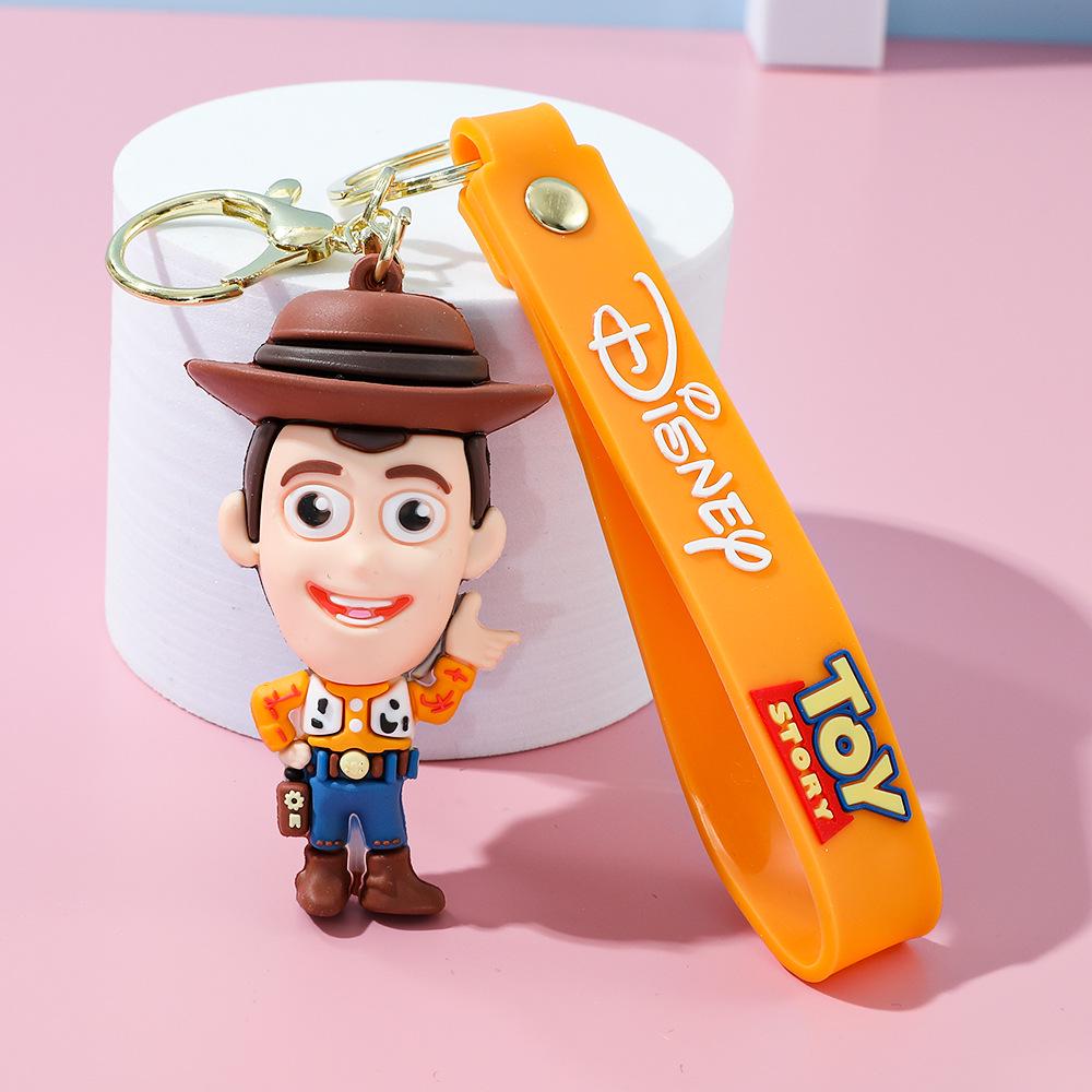 Best-Selling Toy Story Figures Keychain: Three-Eyed Alien, Buzz Lightyear, and Strawberry Bear Charms