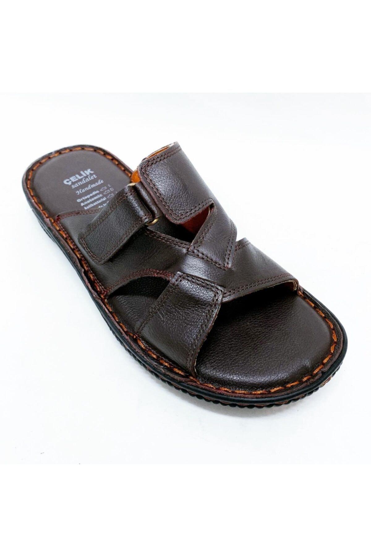 

Коричневі чоловічі тапочки з натуральної шкіри 41