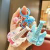 Niedlicher Tier-Gitarren-Schlüsselanhänger: Musikinstrument Spielzeug & Taschenanhänger für Kinder
