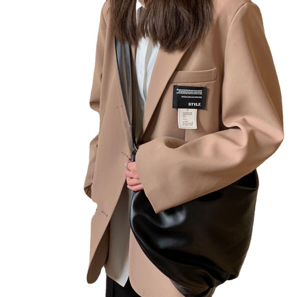 Manteau blazer élégant et coupe ample pour femme, parfait pour le streetwear.