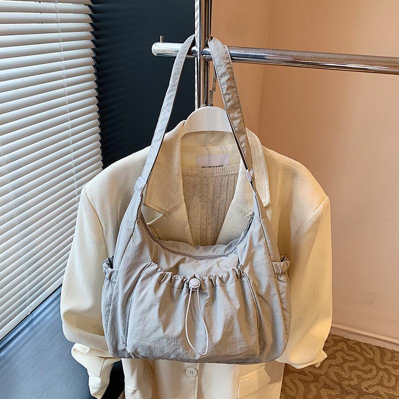 New Large-capacity Lightweight Bag Women's Casual Simple Literary and Artistic Shoulder Bag Fashionable Solid Color Drawstring Messenger Bag